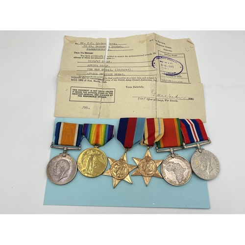 2049 - A WWI and WWII South African medal pair and quadlet presented to 186122 F.C. Liebenberg with origina... 