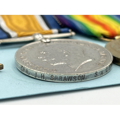 2053 - A WWI South African medal trio presented to Spr. J.H. Sprawson S.A.C.S.C. R.E. with printout of asso... 