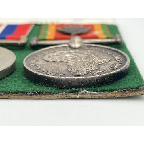 2054 - A WWI and WWII South African medal trio and pair presented to Pte. A. McPherson 3rd S.A.I. Bgde. wit... 