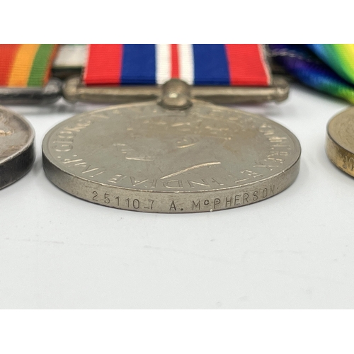 2054 - A WWI and WWII South African medal trio and pair presented to Pte. A. McPherson 3rd S.A.I. Bgde. wit... 