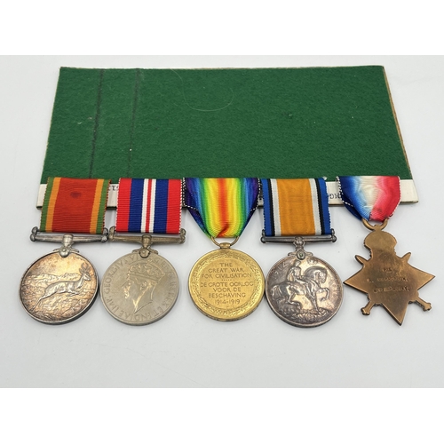 2054 - A WWI and WWII South African medal trio and pair presented to Pte. A. McPherson 3rd S.A.I. Bgde. wit... 