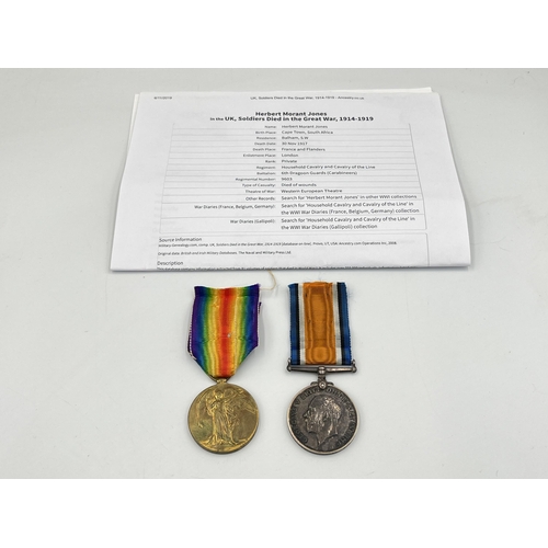 2056 - A WWI medal pair presented D-9603 Pte. H.M. Jones 6-D. Gds. who was killed in action from wounds rec... 