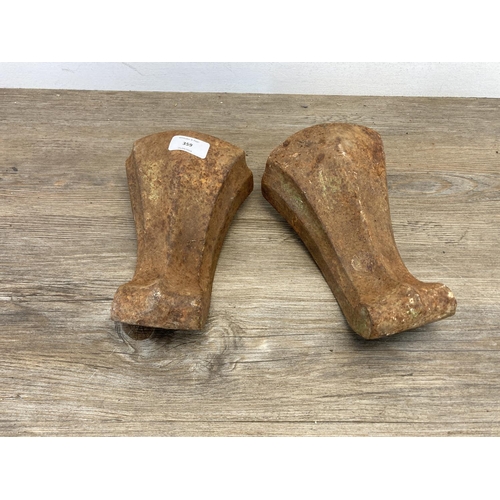 450 - Four Victorian cast iron bath feet - approx. 20cm high