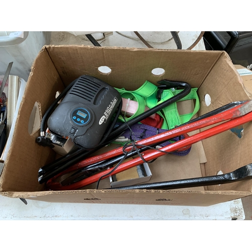 951 - A box containing various tools to include crowbars, air compressor, safety harness etc