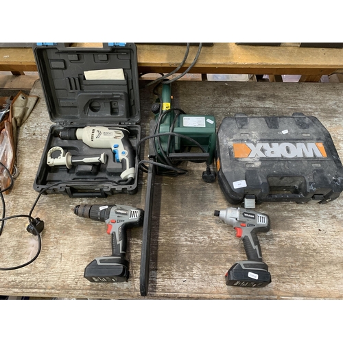 962 - Five power tools to include Wickes cordless drill, Mac Allister hammer drill, Worx combi drill, Oreg... 