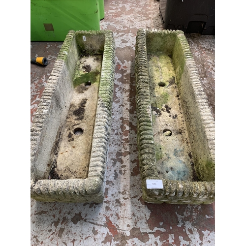 973 - Two cast stone garden planters - approx. 23cm wide x 77cm long x 14cm deep