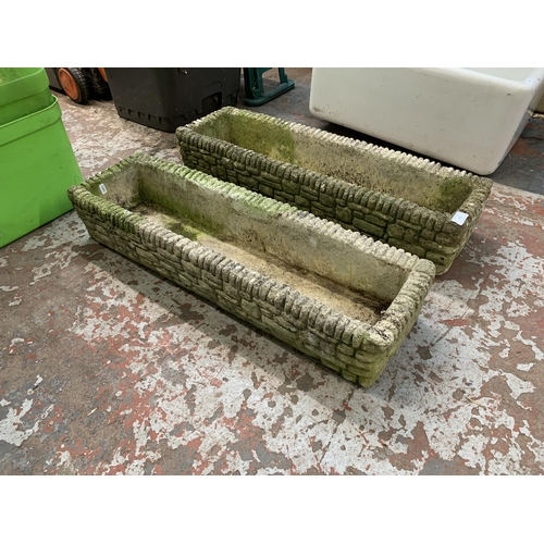 973 - Two cast stone garden planters - approx. 23cm wide x 77cm long x 14cm deep