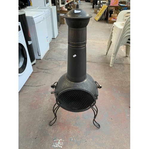 978 - A black metal garden chimenea