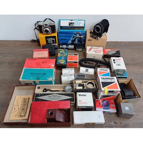 670 - A collection of boxed cameras and photography accessories to include Kodak Brownie 44A, Ihagee exten... 