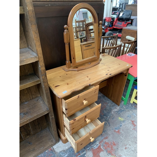 210 - A modern pine dressing table and mirror - approx. 70cm high x 100cm wide x 47cm deep