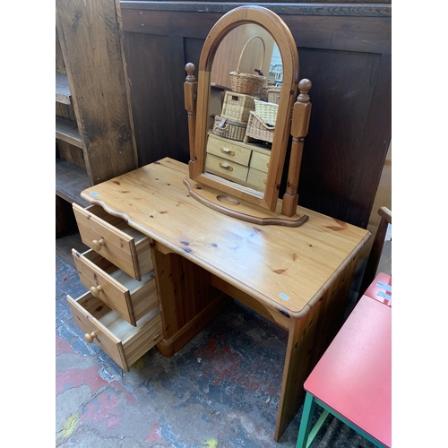 210 - A modern pine dressing table and mirror - approx. 70cm high x 100cm wide x 47cm deep