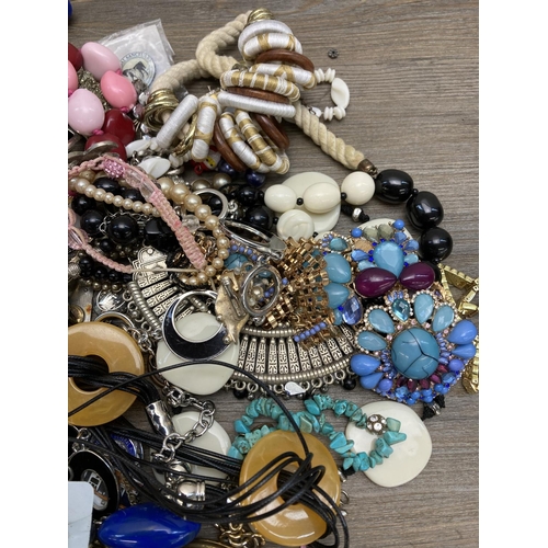 502 - A collection of costume jewellery to include necklaces, bracelets, brooches etc.