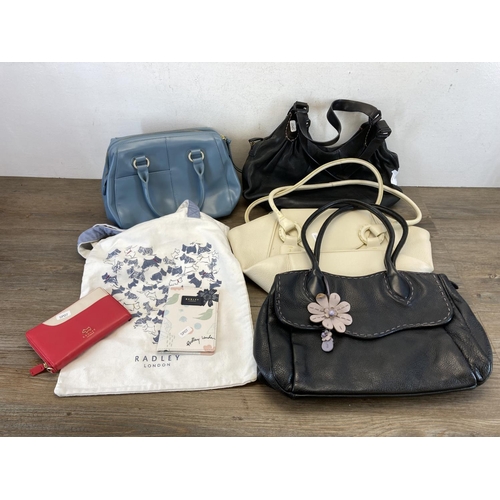 505 - Seven Radley fashion accessories comprising four leather handbags, one tote bag, one leather purse a... 