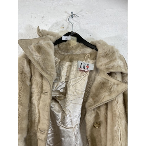 512 - A vintage simulated fur and leather full length jacket