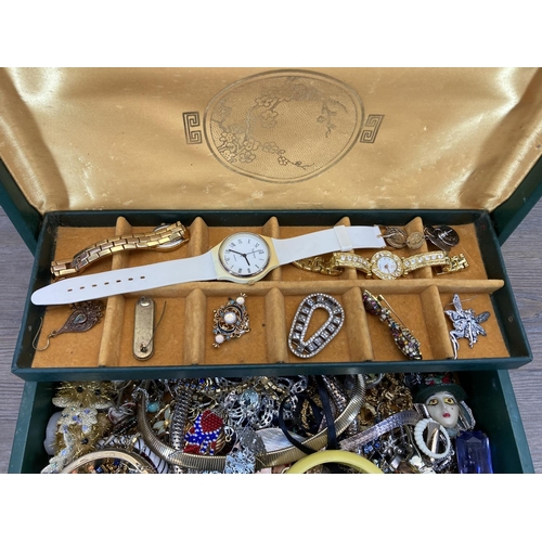 514 - An oriental green jewellery box containing a collection of vintage costume jewellery to include micr... 