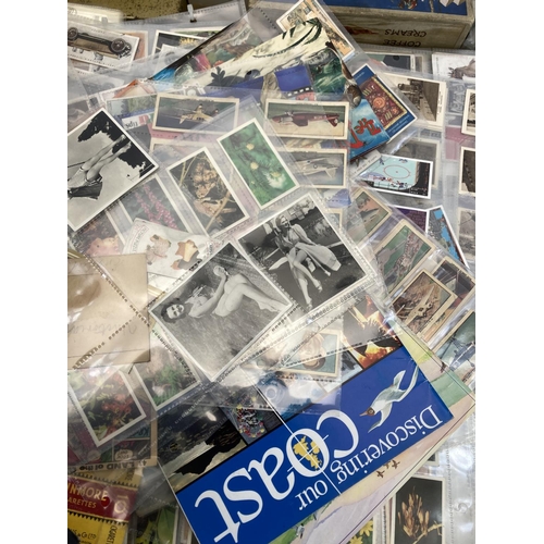 519 - A large collection of vintage collector’s cards to include 1966 Banner Productions Tarzan cards, Sen... 