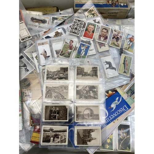 519 - A large collection of vintage collector’s cards to include 1966 Banner Productions Tarzan cards, Sen... 