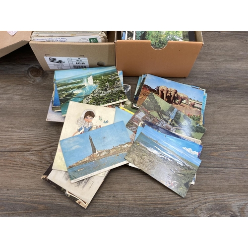 520 - A large collection of vintage postcards