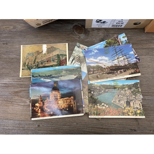 520 - A large collection of vintage postcards