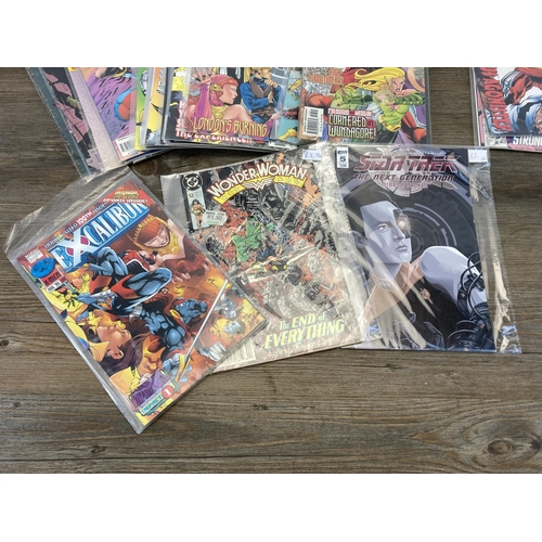 523 - A collection of Marvel comics to include Excalibur, Wonder Woman, X Factor, X-Force etc.