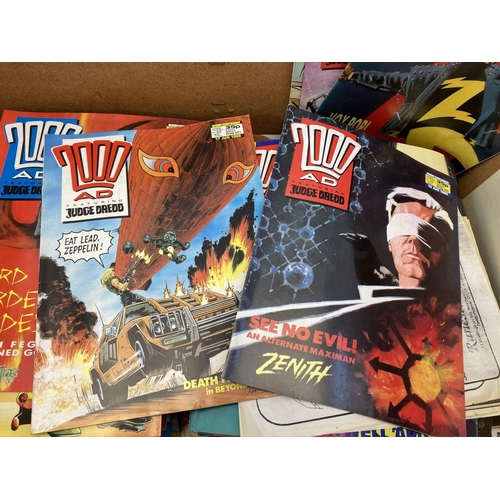 527 - A collection of vintage annuals and comics to include 2000AD, Dr Who, TV21 etc.