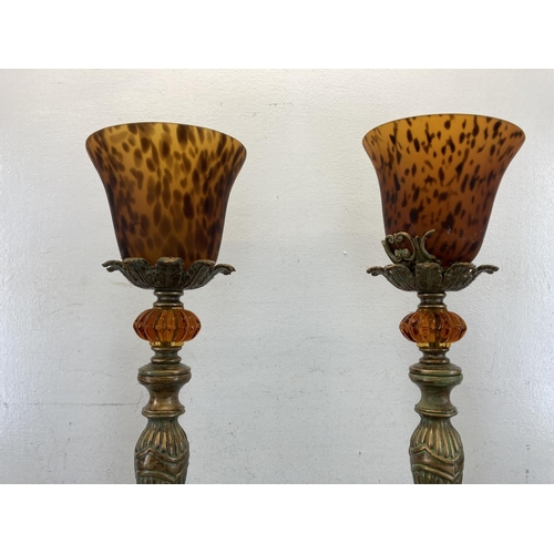 536 - A pair of contemporary French style cast metal patinated table lamps with orange and black mottled g... 