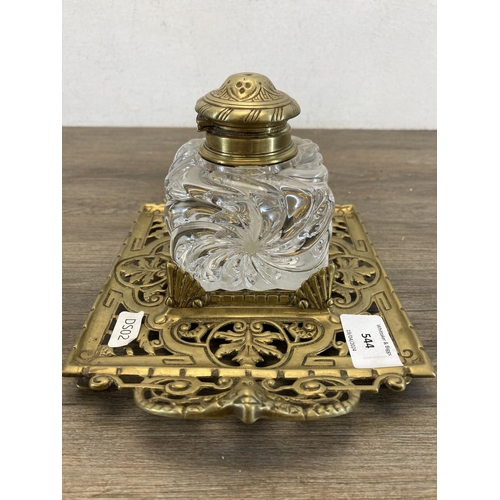 544 - A 19th century Townshend & Co. brass inkwell stand with pressed glass inkwell and brass top - approx... 