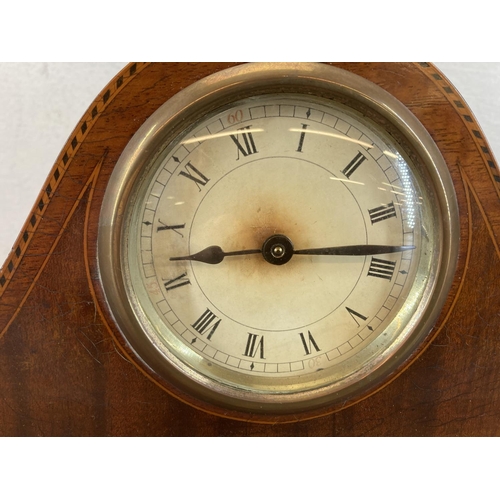 562 - An Edwardian inlaid mahogany key wind mantel clock - approx. 15cm high x 30cm wide x 8.5cm deep