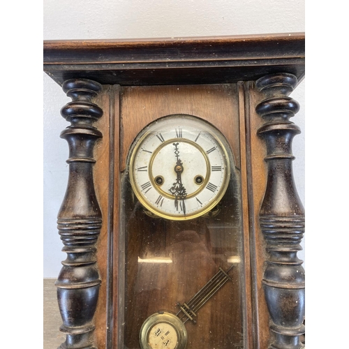 568 - A 19th century mahogany chiming Vienna wall clock - approx. 72cm high x 33cm wide