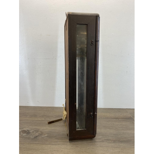 569 - An early/mid 20th century mahogany cased wall clock - approx. 55cm high x 22cm wide