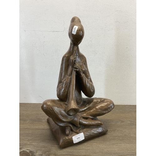 575 - A 1960s Austin Productions plaster figurine of a seated musician by William De Groot - approx. 42cm ... 