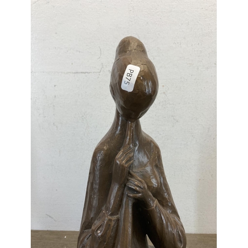 575 - A 1960s Austin Productions plaster figurine of a seated musician by William De Groot - approx. 42cm ... 