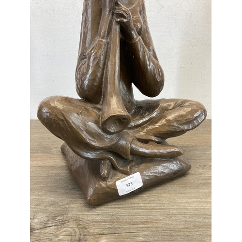 575 - A 1960s Austin Productions plaster figurine of a seated musician by William De Groot - approx. 42cm ... 