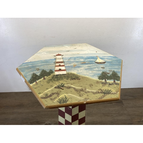 577 - A hand-painted plywood side table in the form of a lighthouse - approx. 59cm high