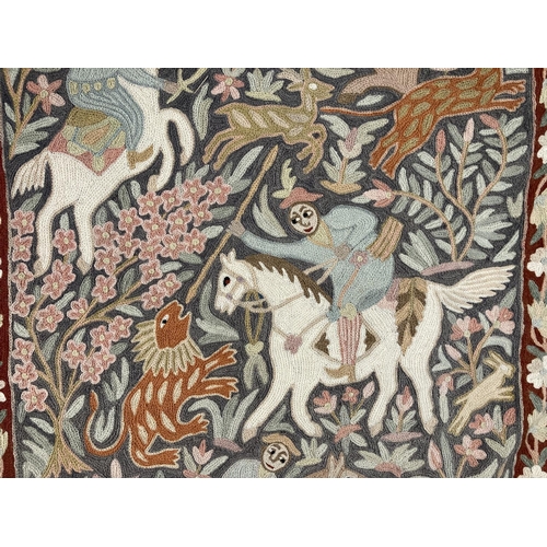 582 - A vintage hand embroidered Persian hunting scene tapestry - approx. 90cm high x 61cm wide