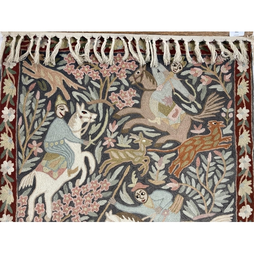 582 - A vintage hand embroidered Persian hunting scene tapestry - approx. 90cm high x 61cm wide