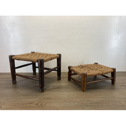 594 - Two early 20th century oak and rush seated footstools - largest approx. 23cm high x 32cm wide x 27cm... 