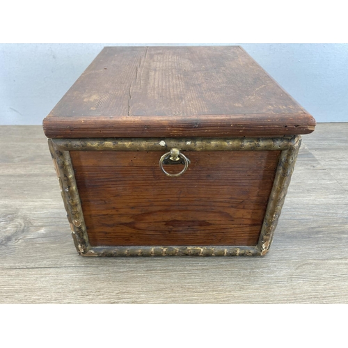 600 - A 19th century pine and gilded storage box with brass handles - approx. 19cm high x 32cm wide x 24.5... 