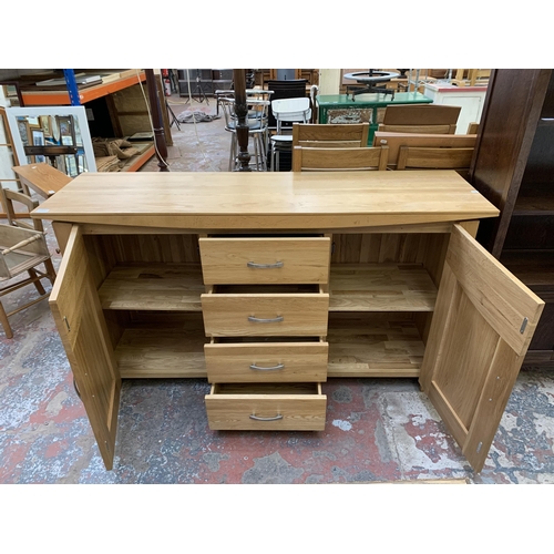 103 - A modern oak sideboard - approx. 88cm high x 160cm wide x 45cm deep