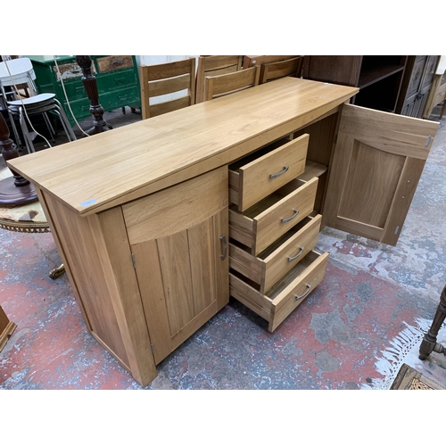 103 - A modern oak sideboard - approx. 88cm high x 160cm wide x 45cm deep