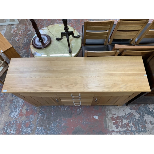 103 - A modern oak sideboard - approx. 88cm high x 160cm wide x 45cm deep