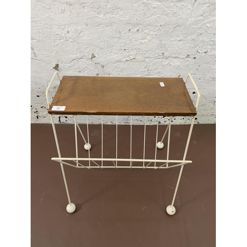 105 - A mid 20th century white painted metal and teak atomic sputnik magazine rack side table - approx. 55... 