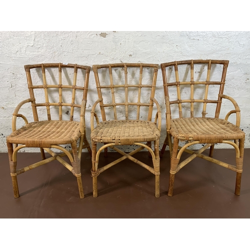 108 - Three mid 20th century wicker and cane bistro chairs