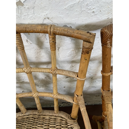 108 - Three mid 20th century wicker and cane bistro chairs