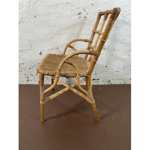 108 - Three mid 20th century wicker and cane bistro chairs