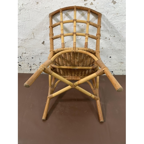 108 - Three mid 20th century wicker and cane bistro chairs