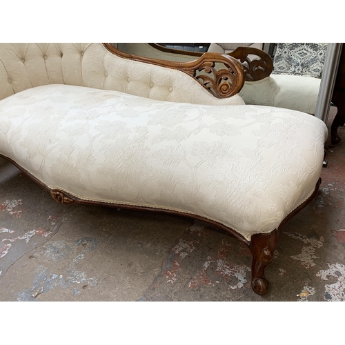 111 - A Victorian carved walnut and fabric upholstered chaise longue - approx. 83cm high x 158cm wide x 86... 