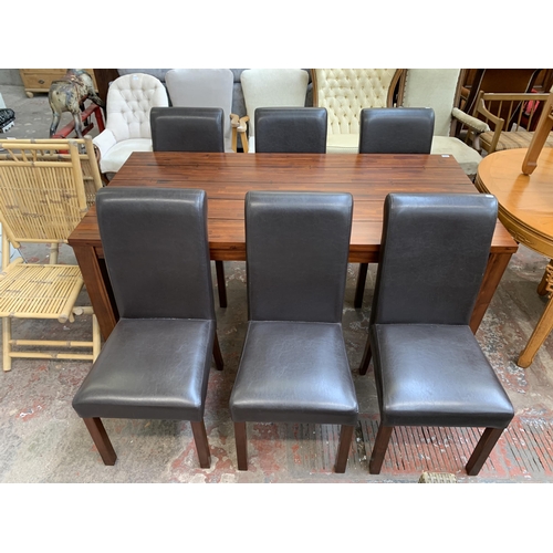 115 - A modern hardwood rectangular dining table and six brown leatherette upholstered chairs - approx. 78... 