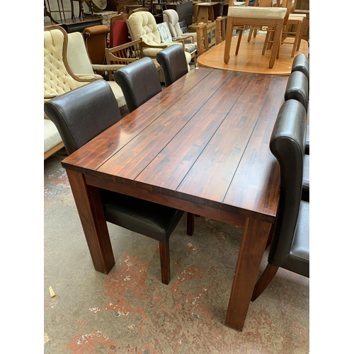 115 - A modern hardwood rectangular dining table and six brown leatherette upholstered chairs - approx. 78... 