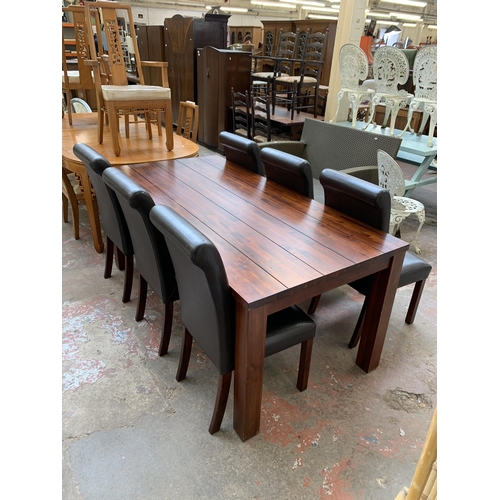 115 - A modern hardwood rectangular dining table and six brown leatherette upholstered chairs - approx. 78... 